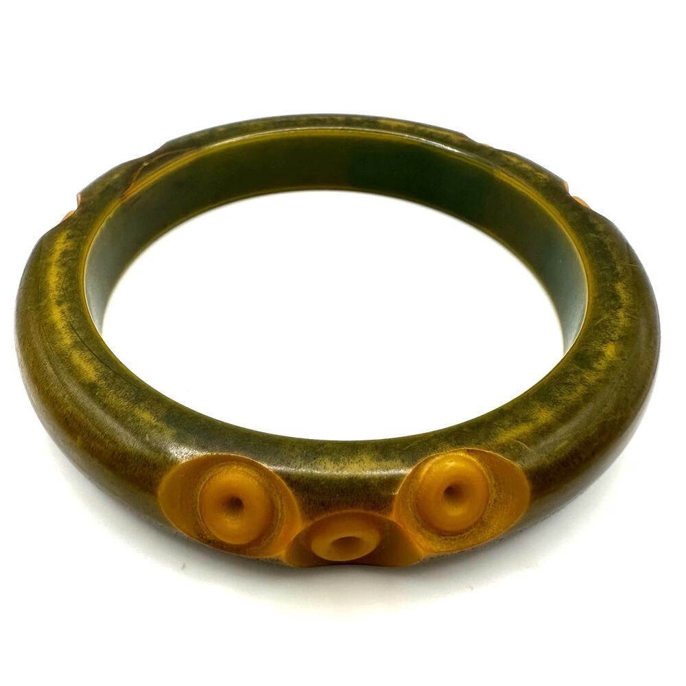 Antique Art Deco spinach green butterscotch carved Bakelite bangle bracelet
